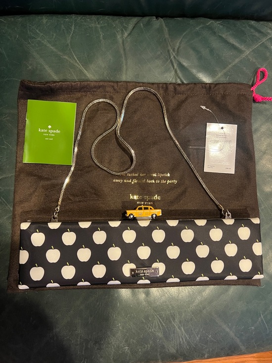 kate spade Handbags - kate spade Black and White Apple Print Clutch with Yellow Taxi Clasp